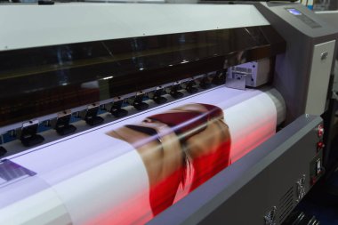 Large format of the printing machine in the printing house. Industry