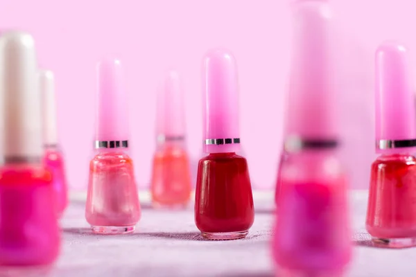 bright pink nail polish the back is pink Placed alternately, the front and the back are blurred