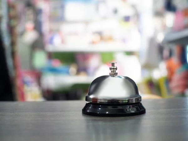 A bell for calling employees in stores or in the reception to provide information in hotels in certain situations.