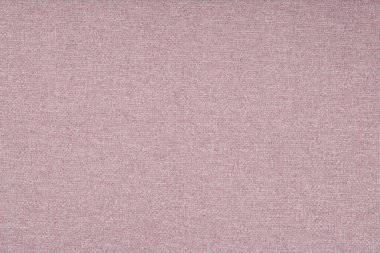 Pink fabric texture - top view and close-up on a piece of ecru linen fabric