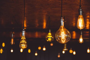 Beautiful vintage light bulb. Retro luxury light bulb hanging decor glowing