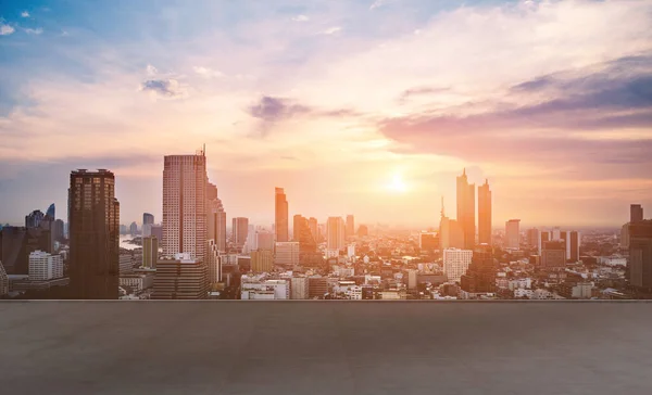 stock image cityscape and skyline of Bangkok urban in twilight time on view from empty concrete floor