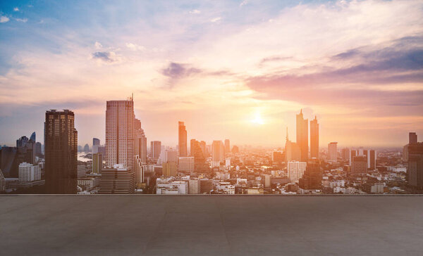 cityscape and skyline of Bangkok urban in twilight time on view from empty concrete floor