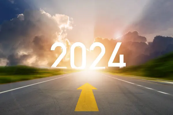 Go to the New Year 2024. Happy New Year greeting card 2024, 2024 letters on the highway road in the destination with arrow on asphalt road with sunset or sunrise light above asphalt road