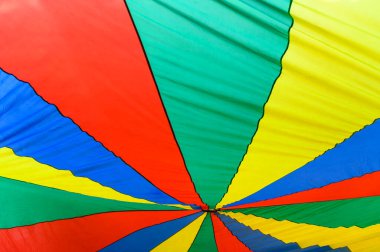 Kumaş desenli gökkuşağı aşk sembolü veya LGBT gurur konsepti. Onur ayı festivalin arka planını kutluyor