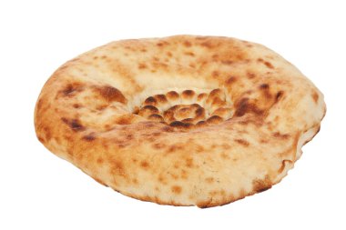 Tandoor 'dan pita doğu ekmeği izole edilmiş müslüman el yapımı tortilla ekmeği.