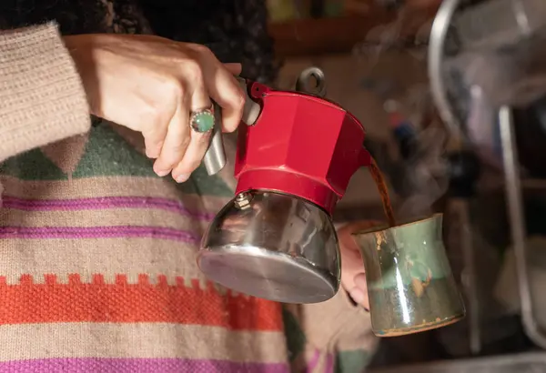 stock image Hand pouring coffee into cup