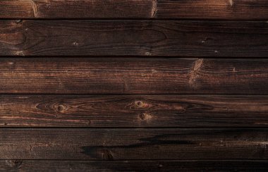 Dark brown wooden background. Boards made of natural wood.