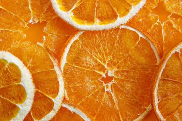 Orange chips, close up. Fruit chips Healthy snack
