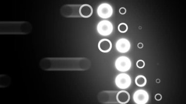 3D parlak halkaların koyu bir arkaplanda çok fazla ışıkla yansıtılması..