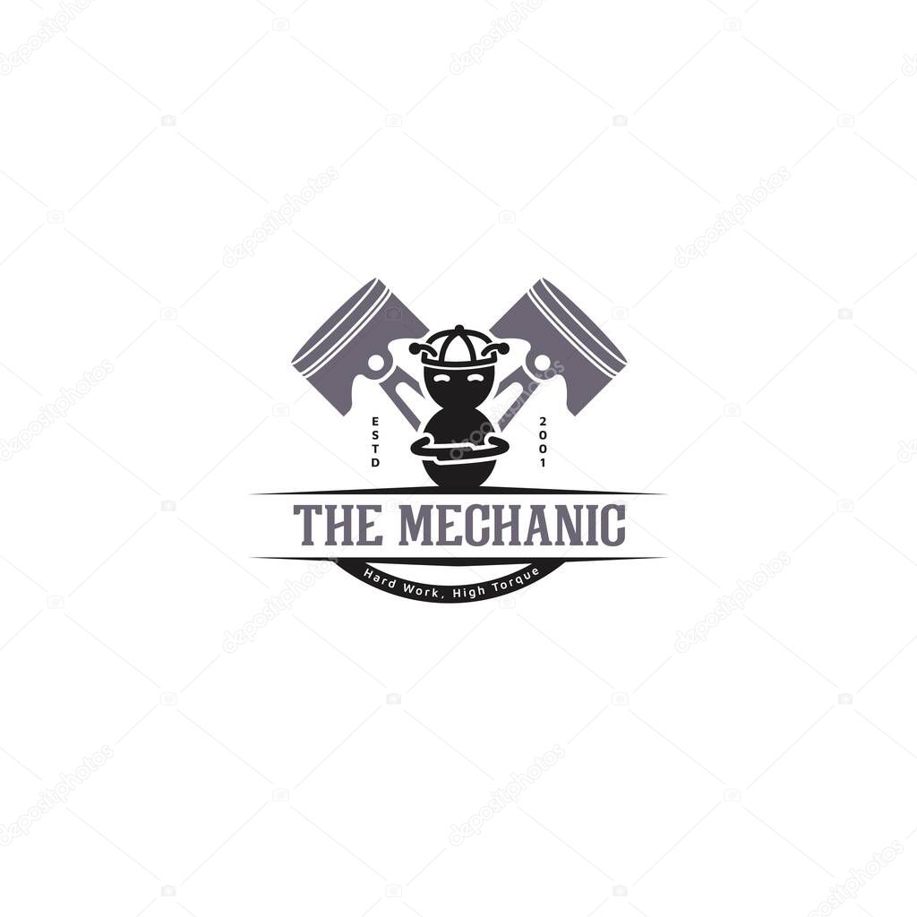 A bold and edgy logo design featuring a cool ant character wearing a backward cap, standing confidently with arms crossed, and two mechanical pistons in the background. Named The Mechanic, this logo represents strength, skill, and reliability.