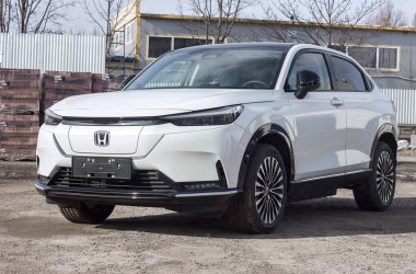 Lviv Ukraine - 03 04 2023: Electric new white car Honda E-HS1, sale of eco electric vehicles, selective focus