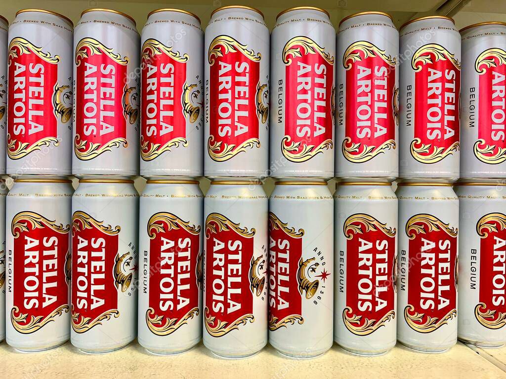 Lviv Ukraine - 06.09 2025: cans of Belgian light beer Stella Artois on a shelf in a store