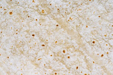 Pita ekmeğinin yakın dokusu. Pita ekmekli sandviç arka planı, mayasız ekmek