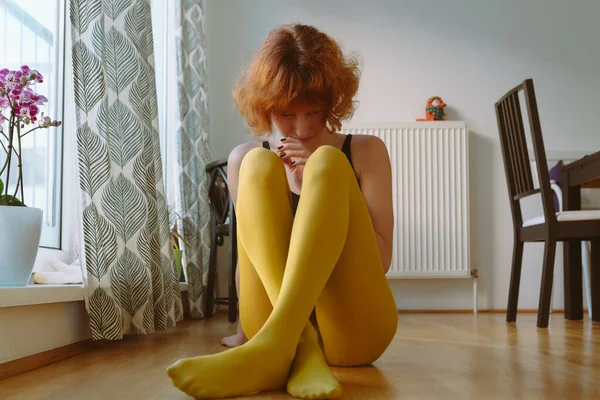 Attractive Teenage Girl Red Curly Hair Wearing Bright Yellow Tights Stock Image