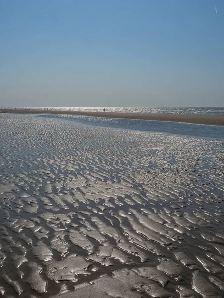 stock image The beach of De Haan at the belgian north sea coast