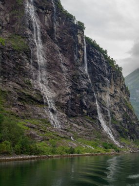 ship cruise in the norwegian fjords