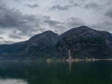 ship cruise in the norwegian fjords