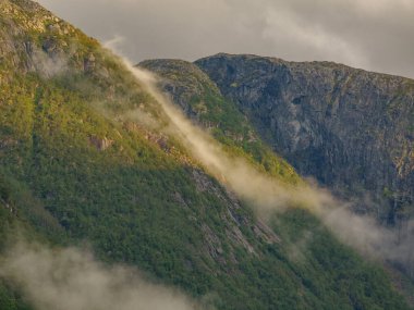 ship cruise in the norwegian fjords