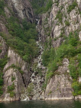 ship cruise in the norwegian fjords