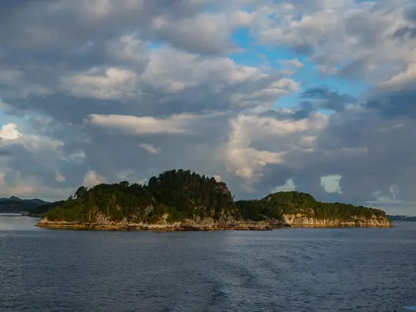 ship cruise in the norwegian fjords