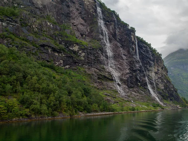 ship cruise in the norwegian fjords