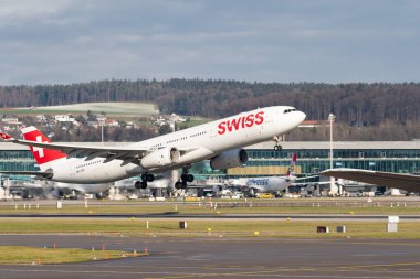 Zurich, Switzerland, January 19, 2023 Swiss international airlines Airbus A330-343 aircraft is taking off from runway 16