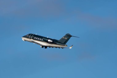 Zurich, Switzerland, January 19, 2023 Bombardier Challenger 650 business aircraft is departing from runway 28