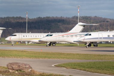Zurich, Switzerland, January 19, 2023 Different Gulfstream business aircraft are parking on the apron during the world economic forum in Davos