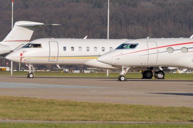 Zurich, Switzerland, January 19, 2023 Different Gulfstream business aircraft are parking on the apron during the world economic forum in Davos