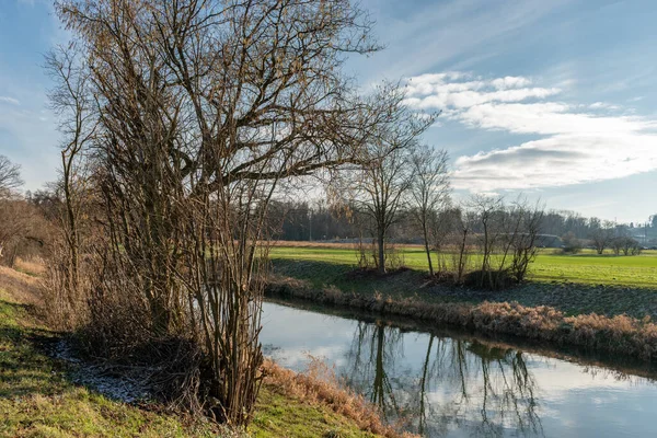 Zurich, Switzerland, January 19, 2023 Landscape scenery with a small river at the international airport