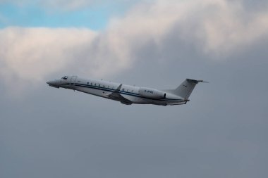Zurich, Switzerland, January 20, 2023 Embraer Legacy 650E business aircraft takeoff from runway 28 after the world economic forum in Davos