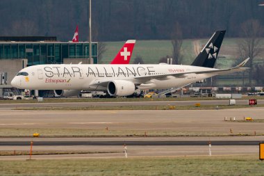 Zurich, Switzerland, January 20, 2023 Ethiopian Star Alliance Airbus A350-941 aircraft is taxiing to its position