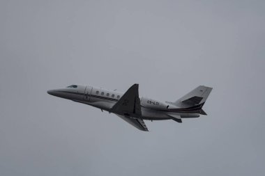 Zurich, Switzerland, January 20, 2023 Cessna Citation Latitude business aircraft is taking off from runway 28 after the world economic forum in Davos