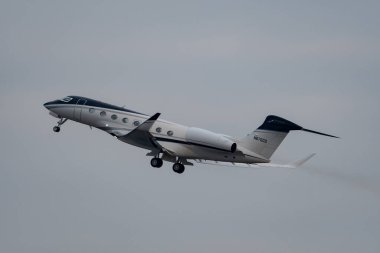 Zurich, Switzerland, January 20, 2023 Gulfstream G650-ER business aircraft is taking off from runway 28 after the world economic forum in Davos