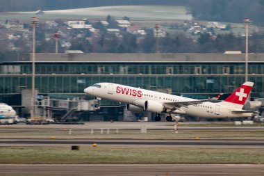 Zurich, Switzerland, January 20, 2023 Swiss international airlines Bombardier CS-300 or A220 aircraft takeoff from runway 28