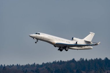 Zurich, Switzerland, January 20, 2023 Dessault Falcon 8X business aircraft taking off from runway 28 after the world economic forum in Davos
