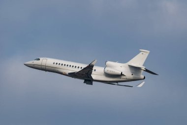 Zurich, Switzerland, January 20, 2023 Dessault Falcon 8X business aircraft taking off from runway 28 after the world economic forum in Davos