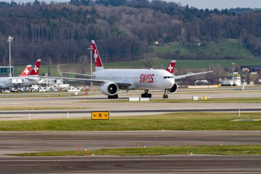 Zurich, Switzerland, January 20, 2023 Swiss international airlines Boeing 777-3DEER aircraft is taxiing to its position