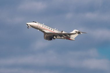 Zurich, Switzerland, January 20,2023 Bombardier Challenger 350 business aircraft takeoff from runway 28 after the world economic forum in Davos
