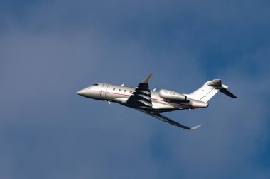 Zurich, Switzerland, January 20,2023 Bombardier Challenger 350 business aircraft takeoff from runway 28 after the world economic forum in Davos