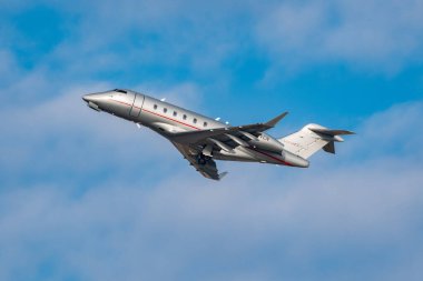 Zurich, Switzerland, January 20,2023 Bombardier Challenger 350 business aircraft takeoff from runway 28 after the world economic forum in Davos