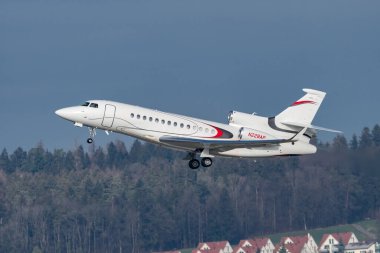Zurich, Switzerland, January 20,2023 Dessault Falcon 7X business aircraft takeoff from runway 28 after the world economic forum in Davos