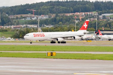 Zurich, Switzerland, September 27, 2022 Swiss international airlines Airbus A340-313X aircraft is taxiing to its position