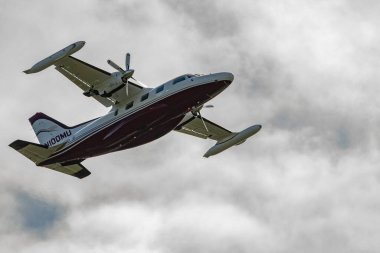 Zurich, Switzerland, September 27, 2022 Mitsubishi MU-2 propeller plane is taking off from runway 32 on a cloudy day