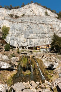 Saint Beatus, Canton Bern, Switzerland, February 12, 2023 Beautiful waterfall scenery in the entrance area of the Saint Beatus caves