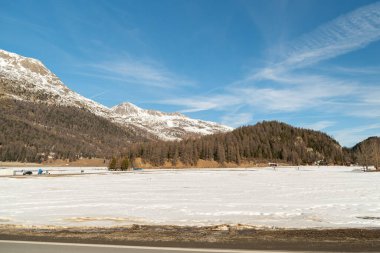 Silvaplana, Switzerland, February 21, 2023 Incredible beautiful winter panorama at the lake of Silvaplana