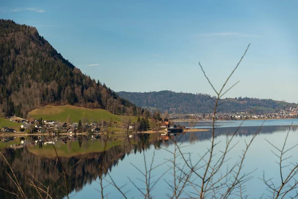 stock image Oberaegeri, Switzerland, February 20, 2023 Fantastic landscape panorama at the Aegerisee on a sunny day