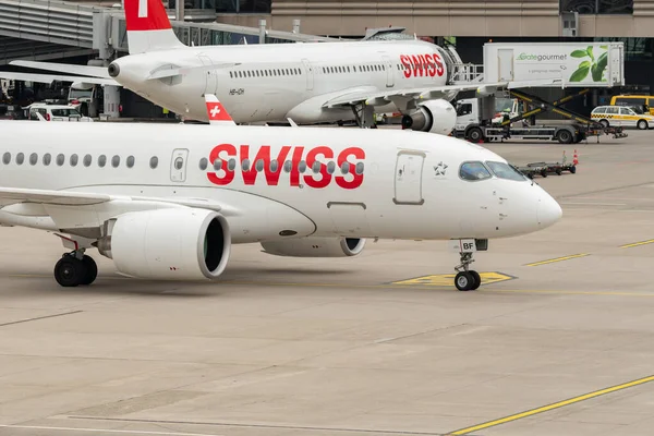 stock image Zurich, Switzerland, May 19, 2023 HB-JBF Swiss international airlines Bombardier CS-100 or Airbus A220 aircraft is taxiing to its parking position