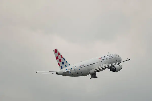 stock image Zurich, Switzerland, May 19, 2023 9A-CTL Croatia Airlines Airbus A319-112 aircraft just after takeoff from runway 10